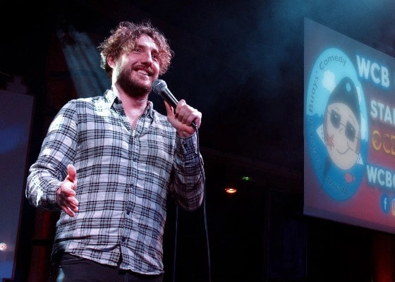 Sean Walsh comedian performing at a WCB Comedy show